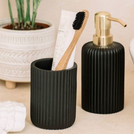 Distributeur de savon en résine noire Distributeur de savon en résine noire