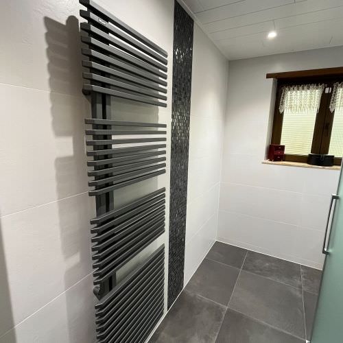 Réorganisation d'une salle de bain avec douche