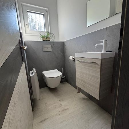 Transformation d’un espace WC : confort et style modernisé Transformation d’un espace WC : confort et style modernisé