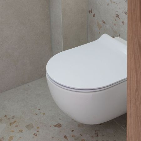 Rénovation toilette effet brut bois & béton