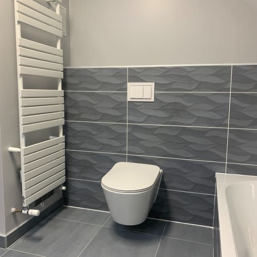 Réorganisation d'une salle de bain avec wc